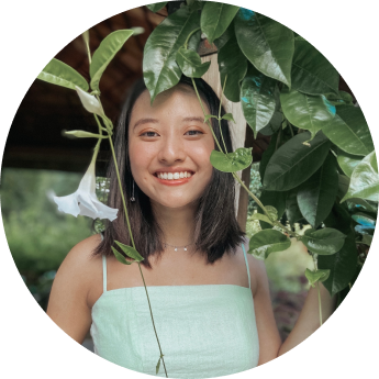vivian posing with surrounding plants